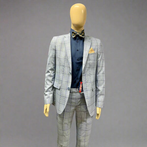 Mannequin wearing a gray checkered suit with a blue shirt and yellow bow tie on a white background
